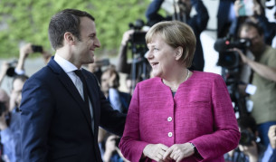 Меркел и Макрон преди началото на първата им среща в Берлин