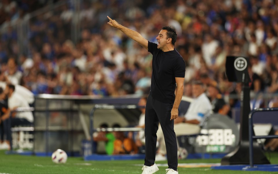 Xavi is shown a red card and he goes to