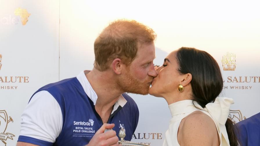 Принц Хари и Меган, херцогинята на Съсекс, присъстваха на Royal Salute Polo Challenge в петък, запечатвайки деня си със страстна целувка