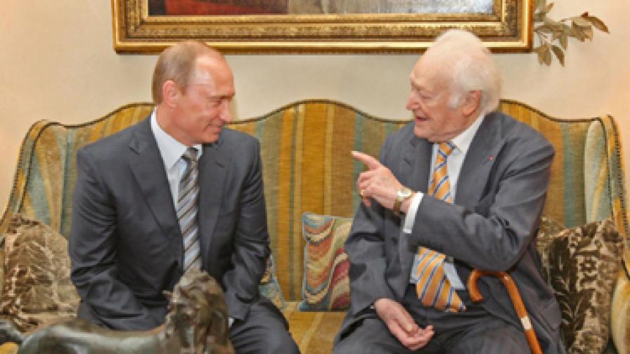 Морис Дюрон при срещата си с Владимир Путин в Москва през 2008 г.