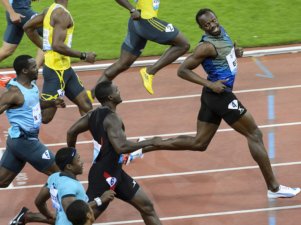 Юсейн Болт от Ямайка по време на надпревара по бягане 100 метра за мъже в Цюрих, Швейцария, на 29 август.